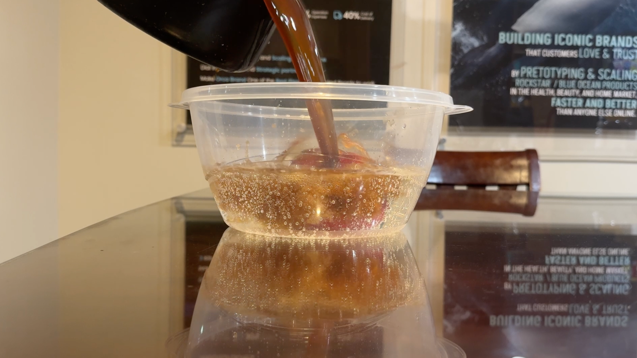 pouring coffee and sparkling water in apple