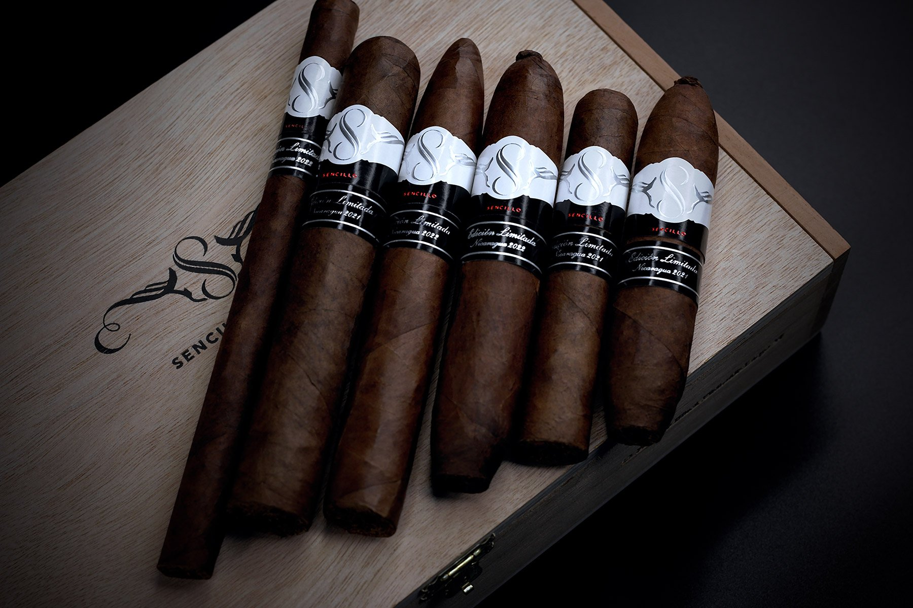 A Sencillo Black Robusto cigar, a twist on the Sencillo brand with a bountiful flavor that lingers and a slightly sweet undertone that tames the spicy flavor
