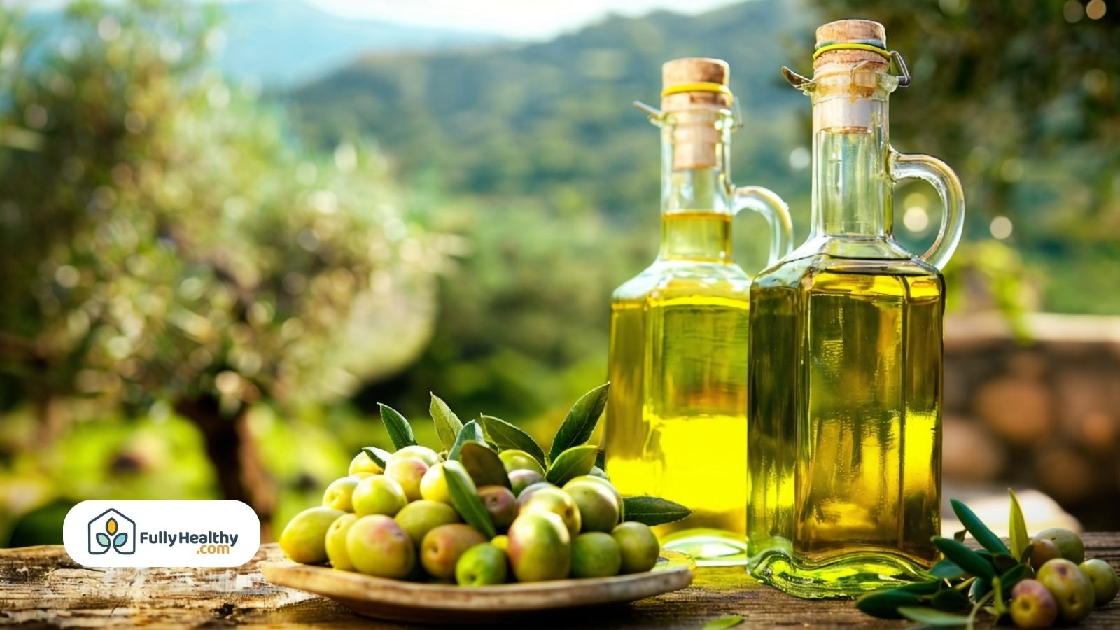 Glass bottles of olive oil with fresh olives on rustic wooden table