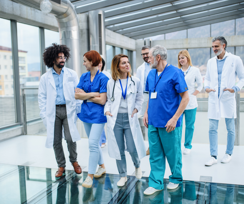 A group of medical professionals discussing multidisciplinary teams