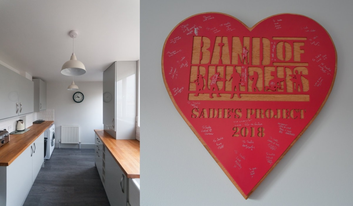 Band of Builders - completed kitchen renovation - large heart shaped 'project complete' plaque in the foreground