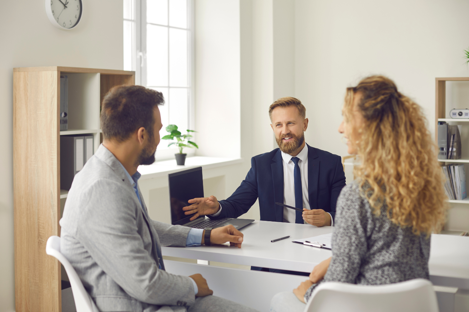 Business broker consulting with clients.