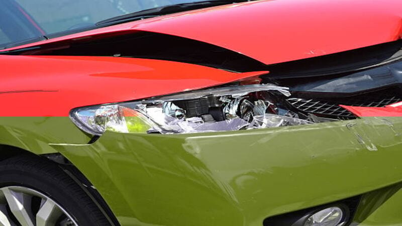 Headlight of a car cracked in an accident.