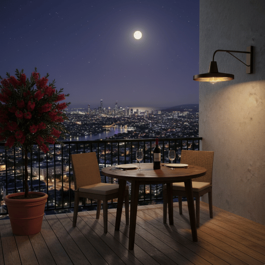Wall-mounted gooseneck light fixture lighting a balcony dining area.