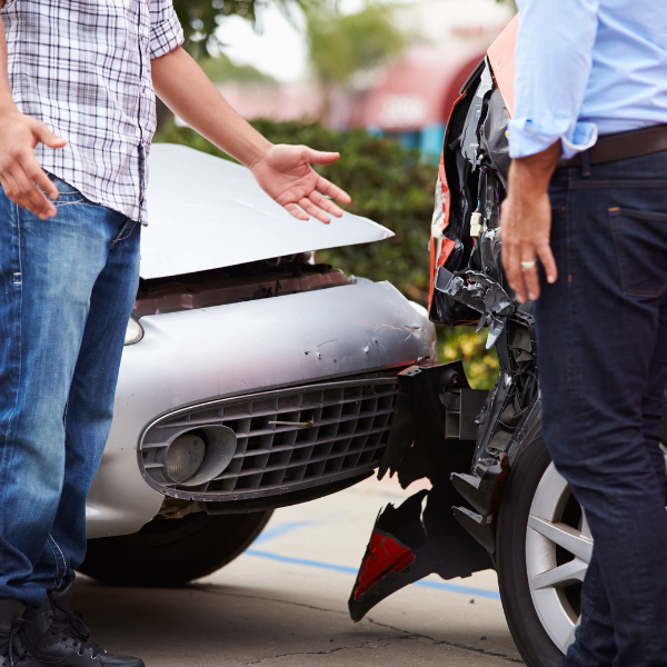 An image showing two drivers avoiding a discussion about fault.