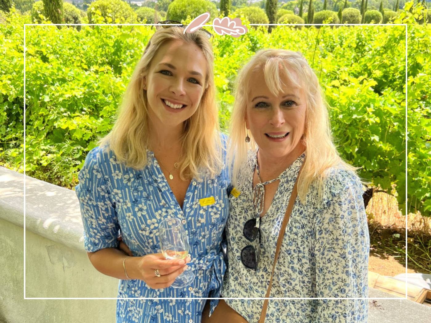 Mother and daughter enjoying a scenic vineyard together, sharing a heartfelt moment. Perfect for a sentimental gift inspiration.