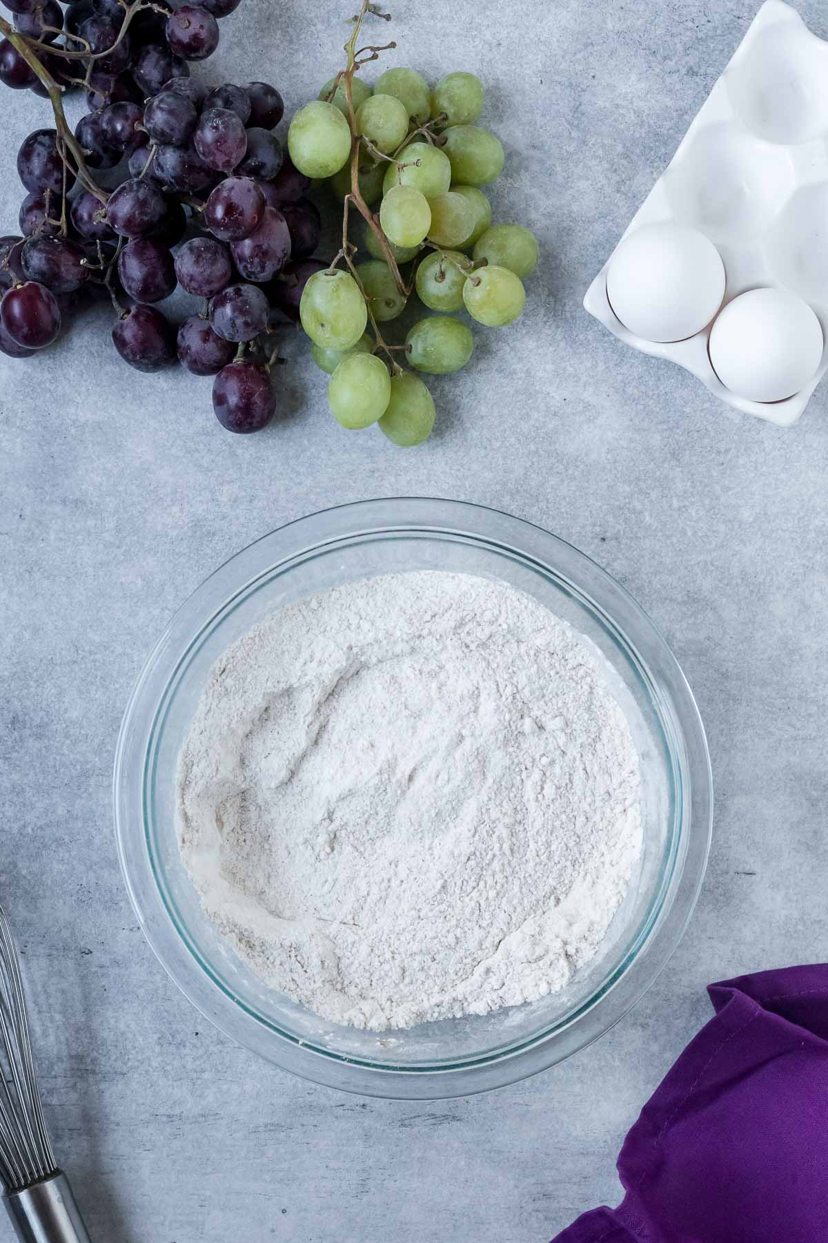 grape bread dry ingredients in a bowl