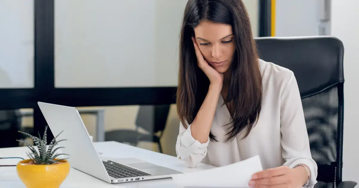 Female creator reviewing Form 668-A after an IRS bank account levy.