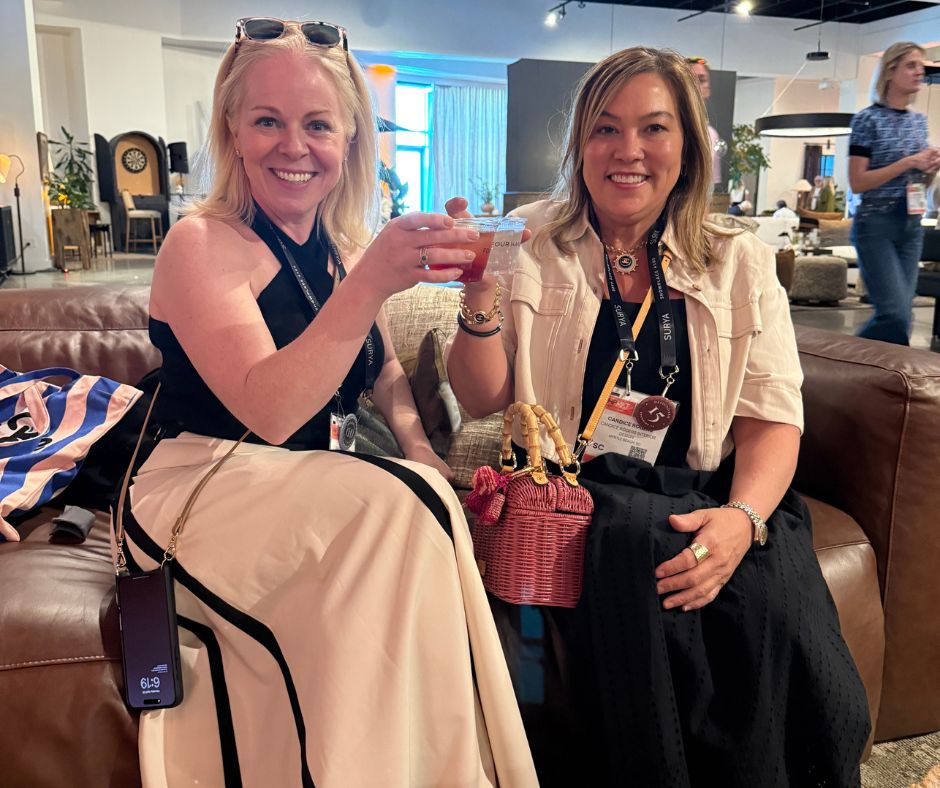two interior designers meeting with drinks
