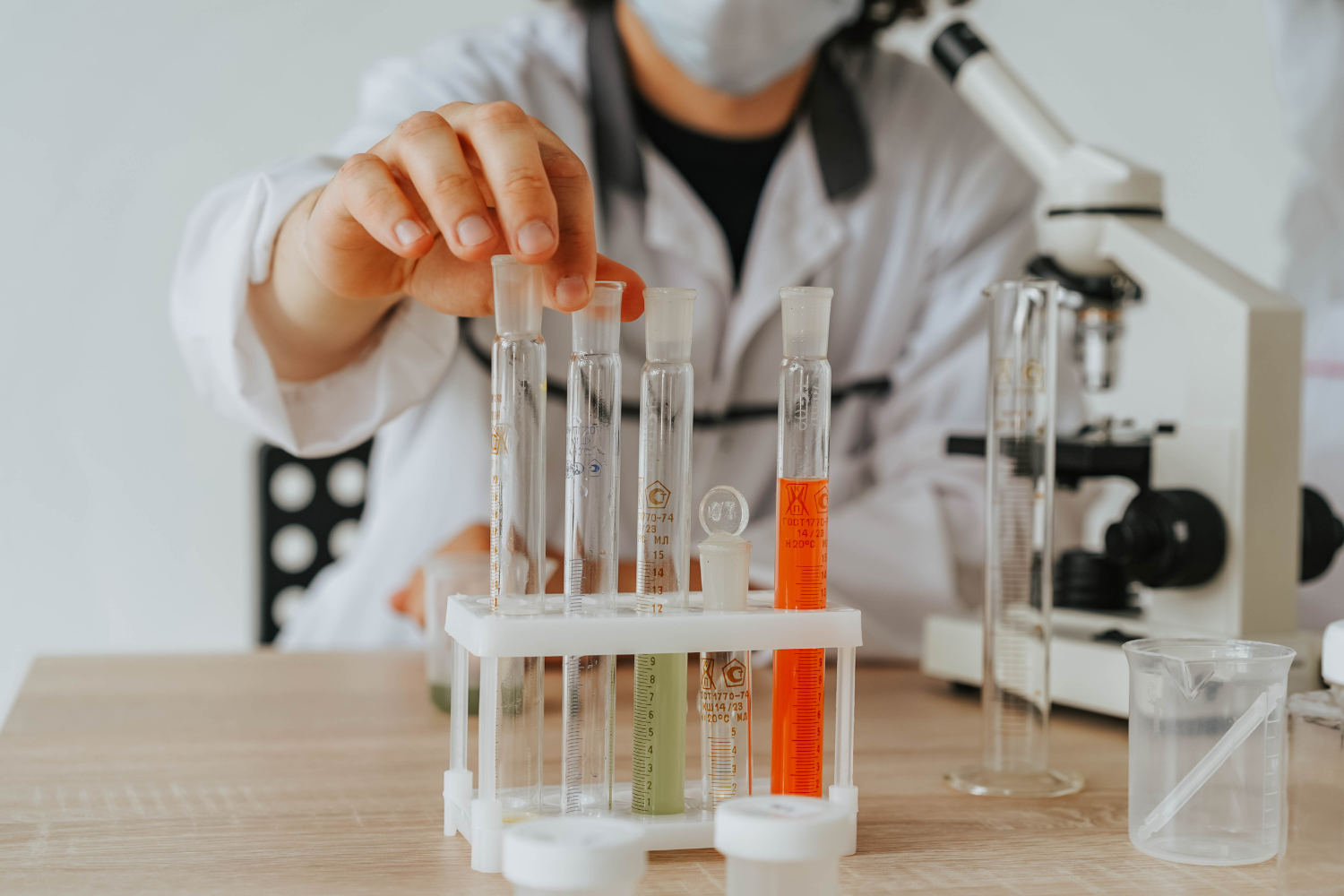 A scientist in a lab creating a custom formulation.