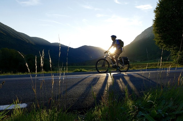 A man cycling on a bike.