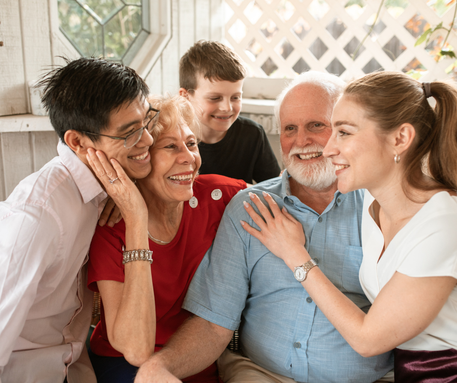                                          A person in a rehab center surrounded by family and friends