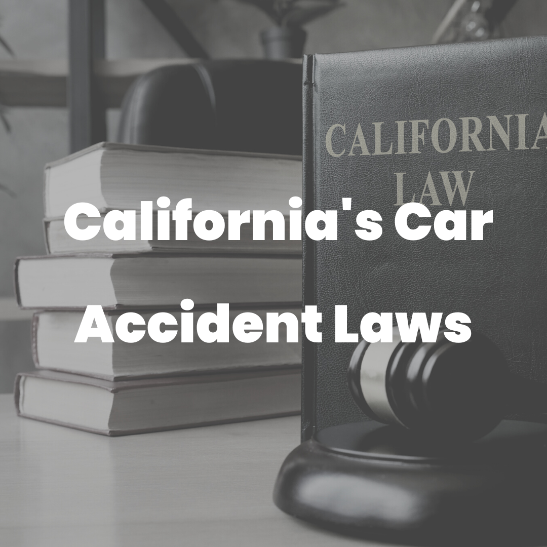 A lawyer discussing California's car accident laws with a client