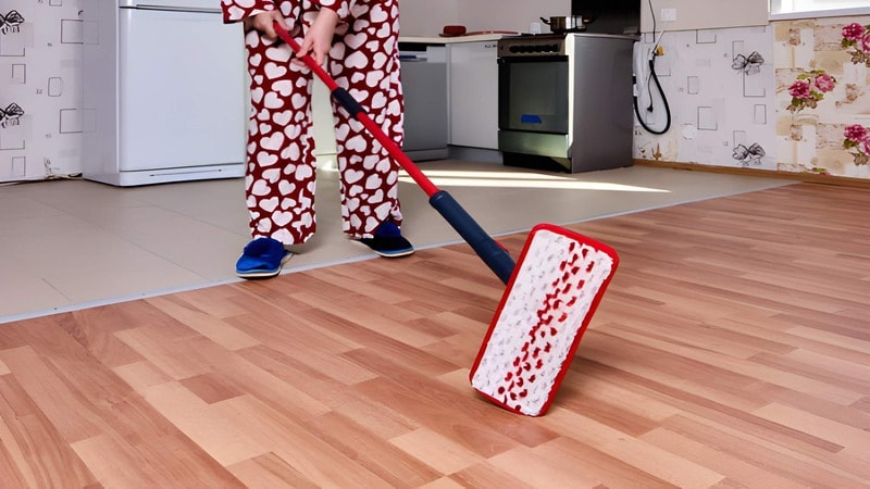 floor cleaning with flat mop and microfiber pad