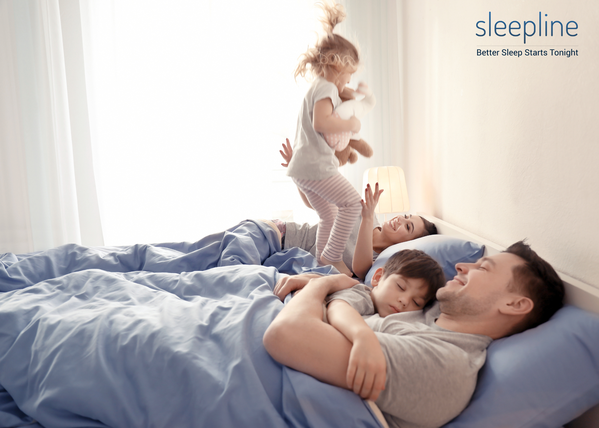 Family sleeping on a latex memory foam mattress