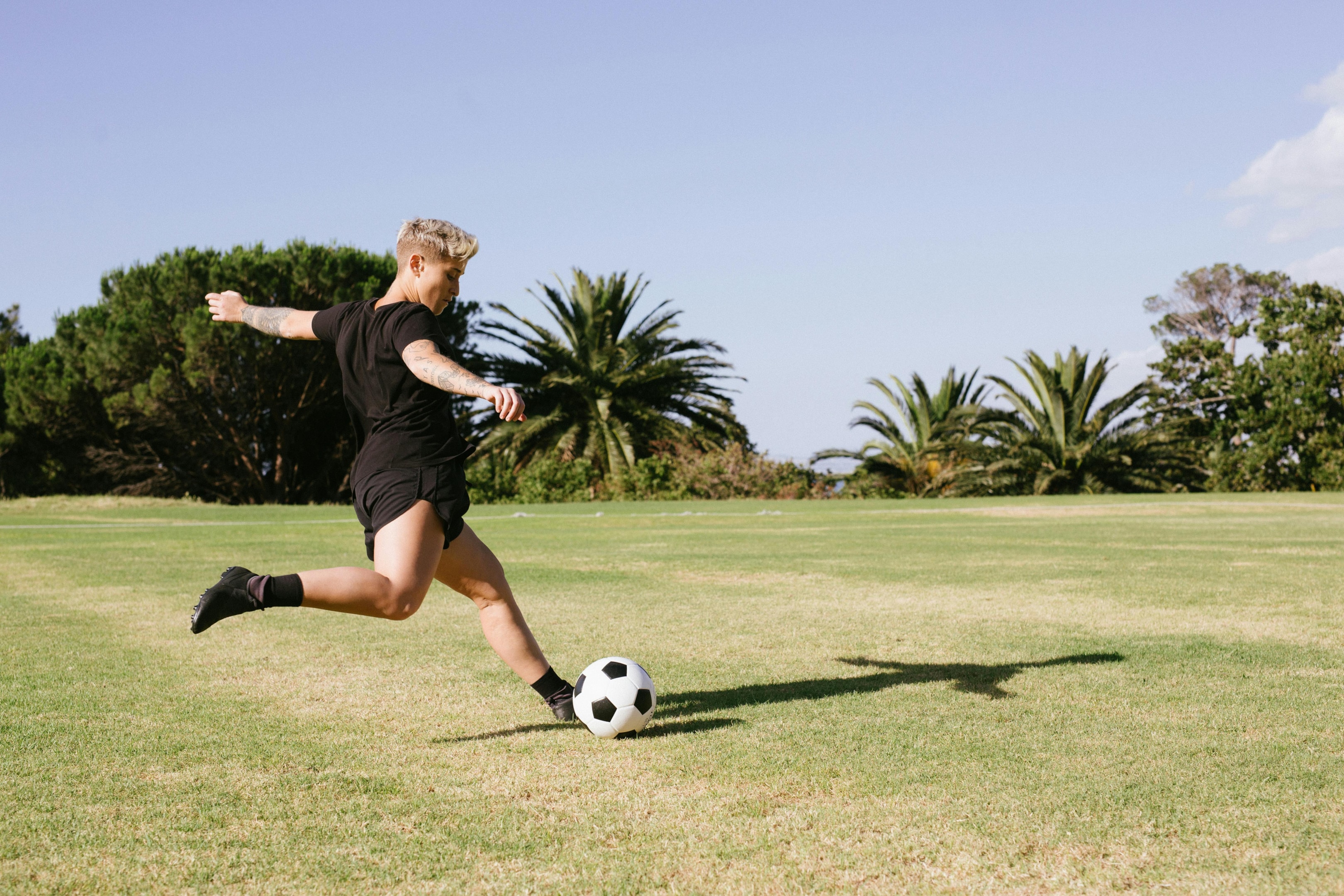 Photo by RF._.studio: https://www.pexels.com/photo/woman-in-black-t-shirt-and-black-shorts-playing-soccer-3618529/