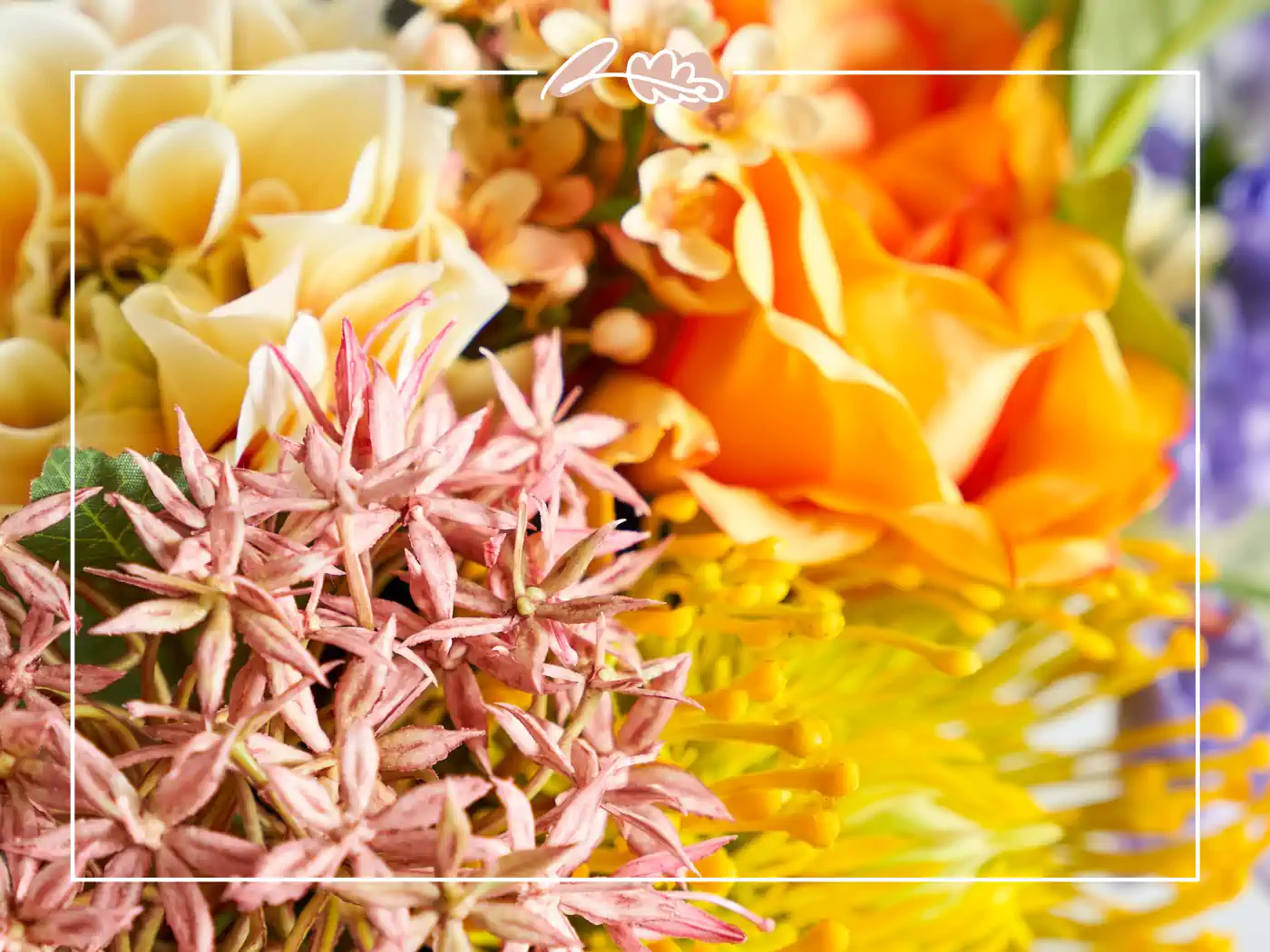 Close-up of colourful artificial flowers with pink, yellow, and orange hues, adding vibrant beauty and texture to any space - Fabulous Flowers and Gifts.