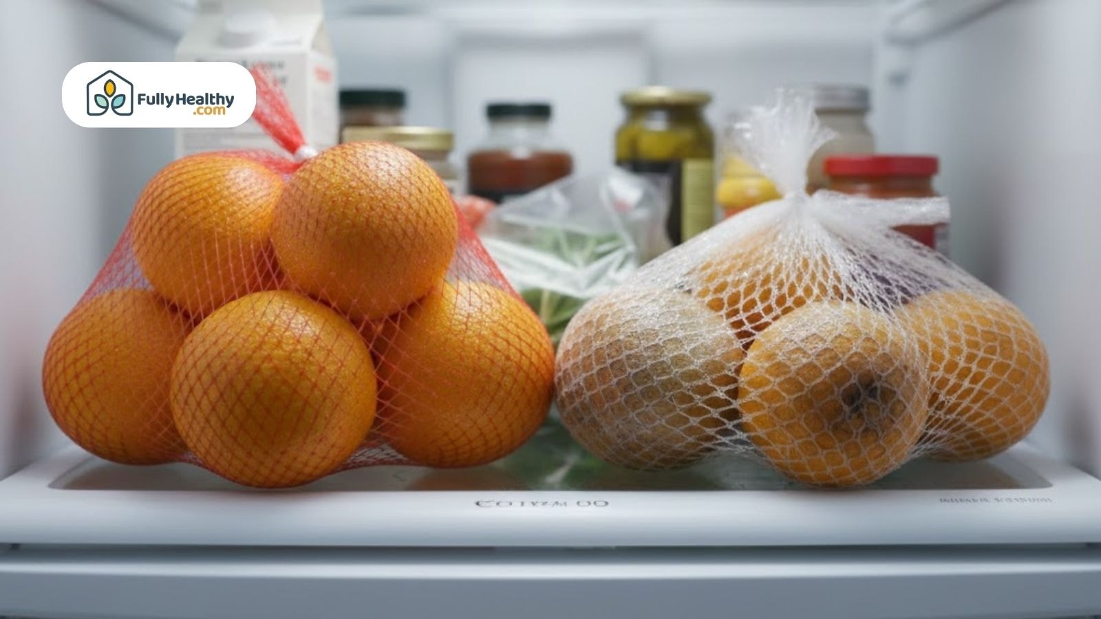Fresh oranges and spoiled ones stored in mesh bags in fridge
