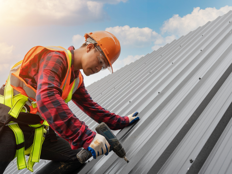 An image showing a professional roofer installing a metal roof in San Antonio, TX. 