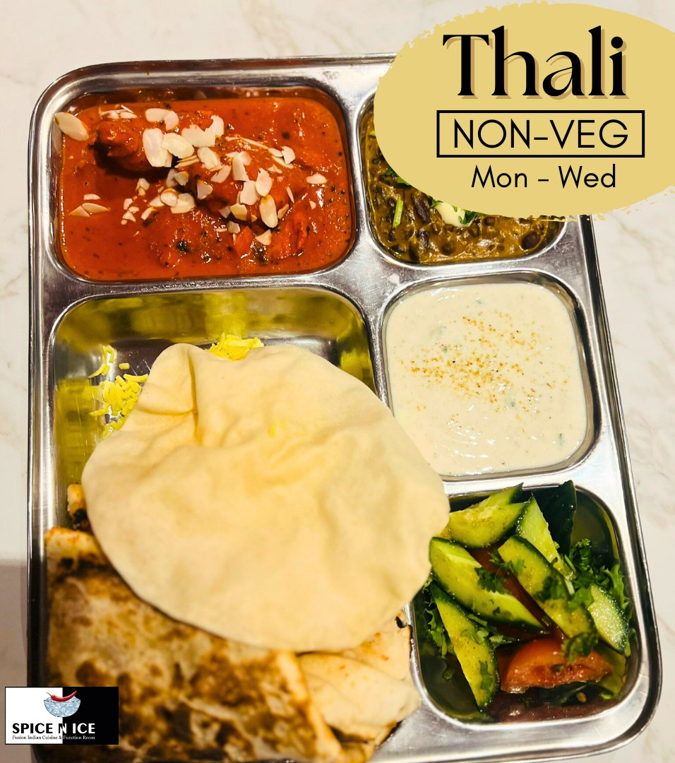 Scrumptious Indian non-veg thali - a flavourful feast showcasing diverse culinary delights.