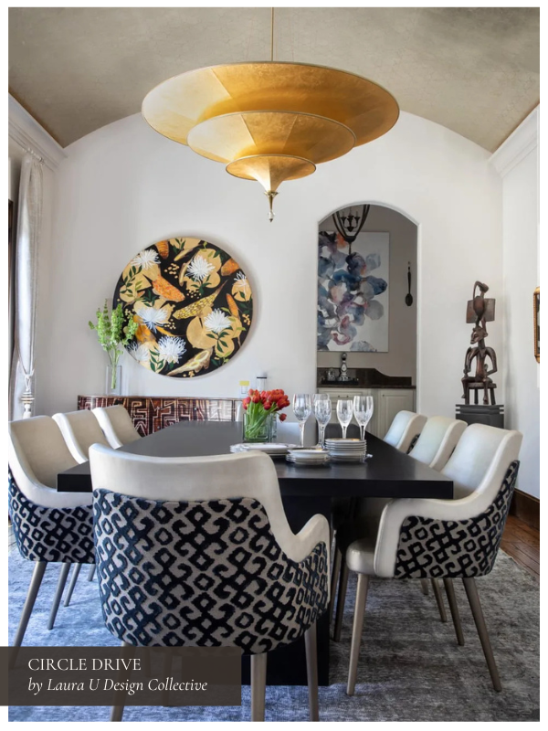 gold and navy Circle Drive dining room with ceiling wallpaper