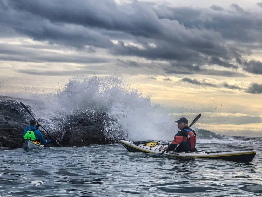 ocean surf, breaking wave, sea kayakers