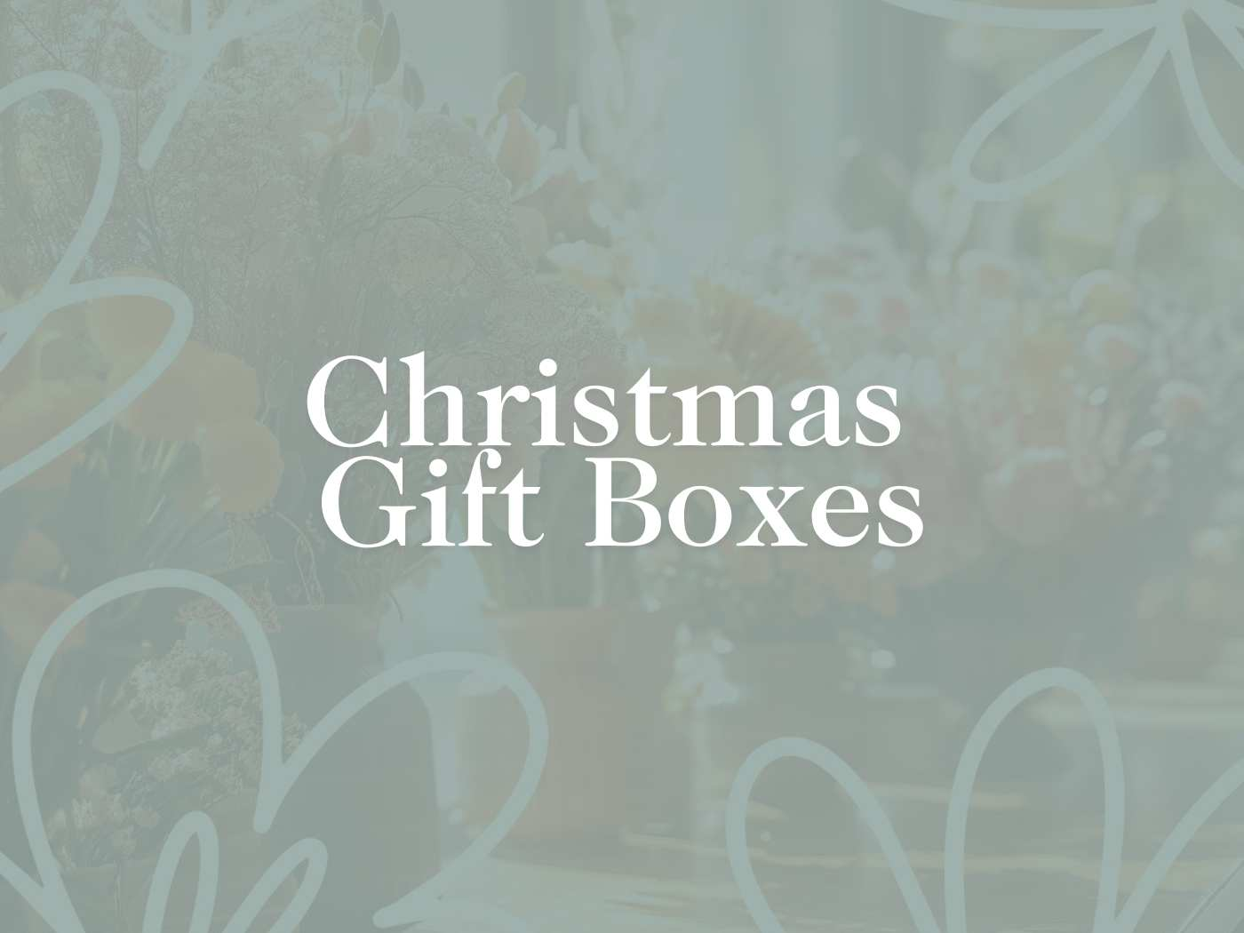 An array of Christmas Gift Boxes with a subtle backdrop, presenting an assortment of Christmas gifts and ideas, perfect for a recipient in Cape Town, South Africa, from the thoughtful collection at Fabulous Flowers and Gifts.