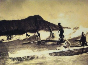 beach boys on paddle boards