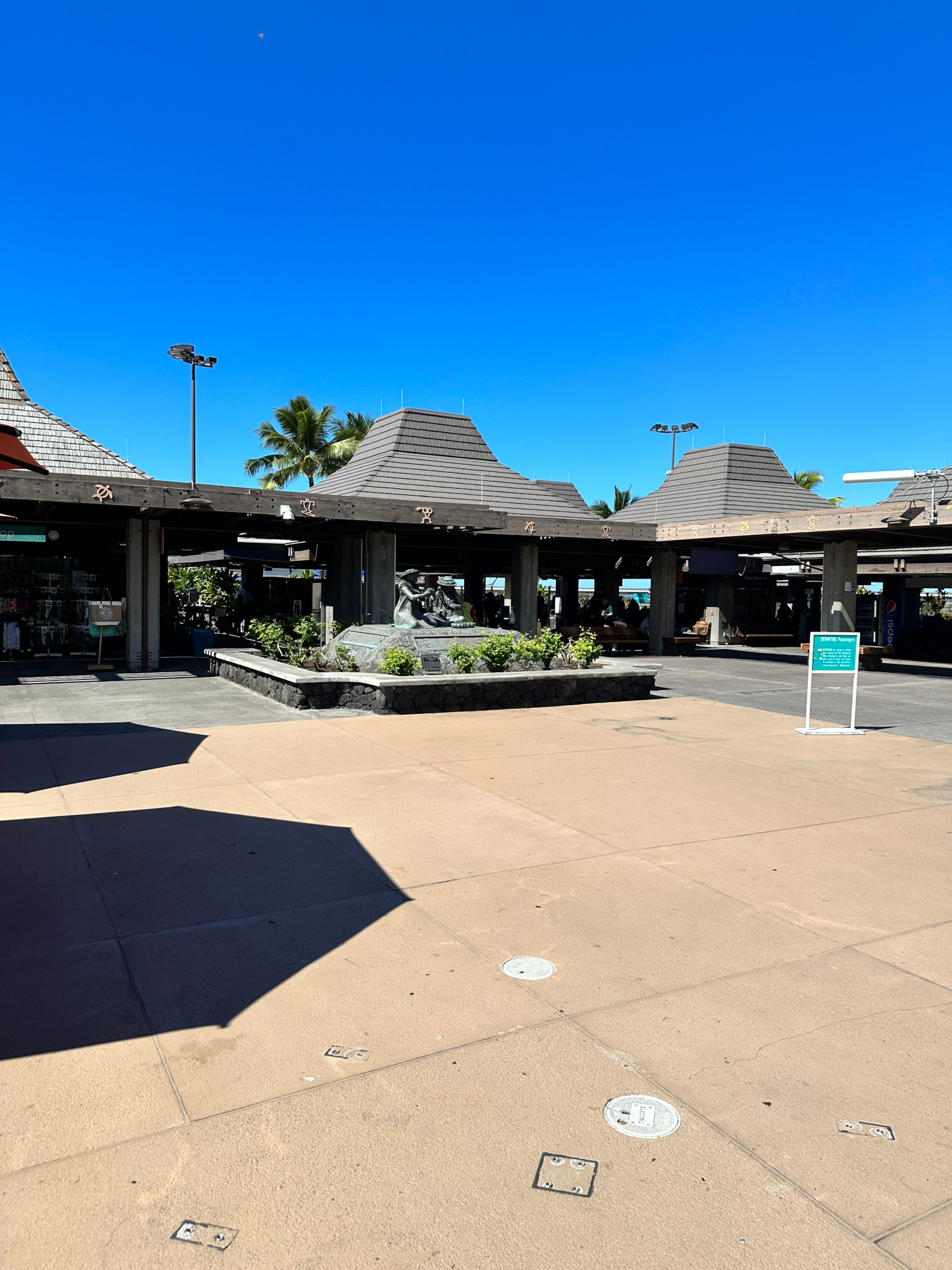 Kona Airport with tiki hut style roofs and open air design