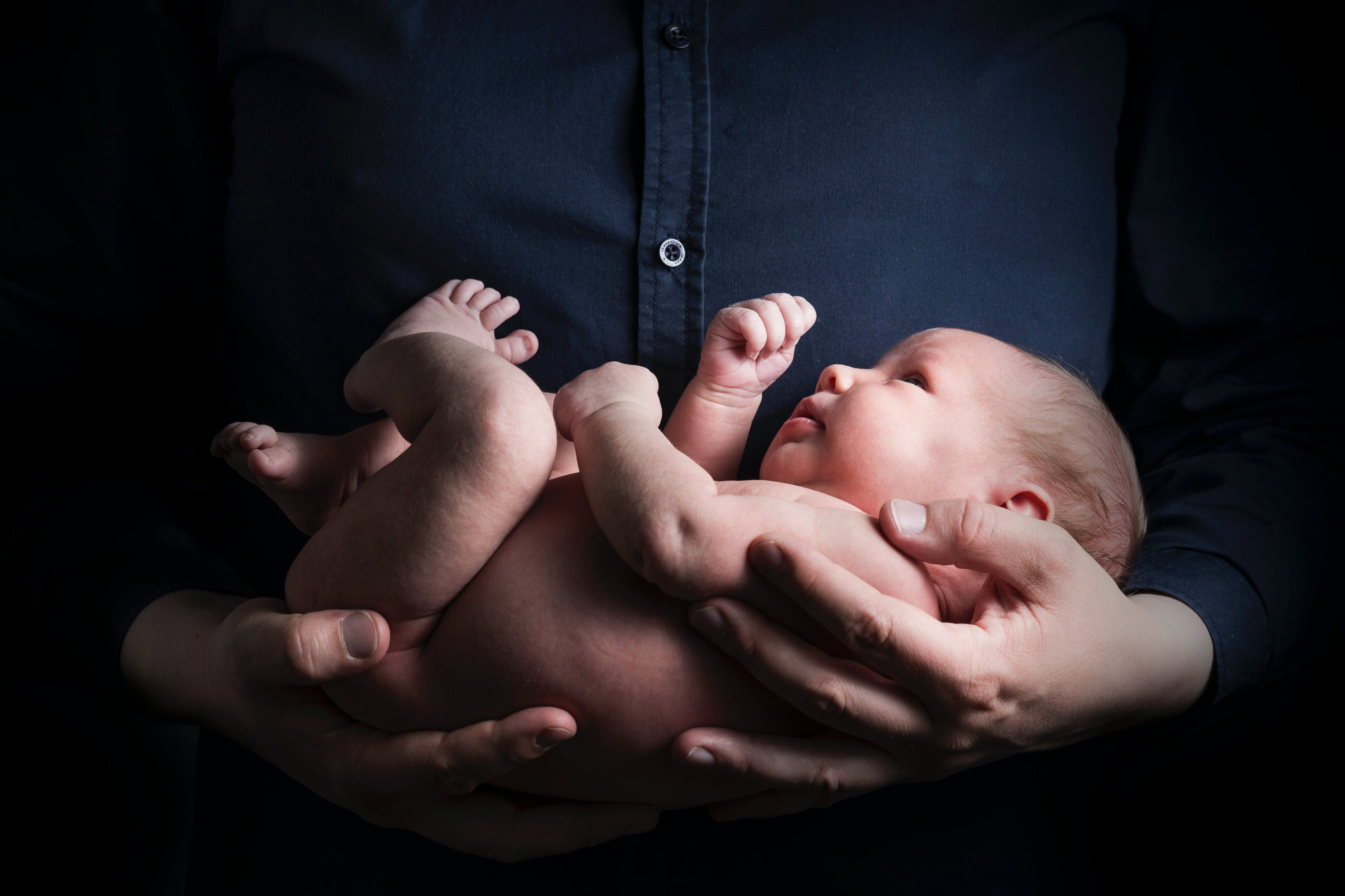 Photo by Rene Asmussen: https://www.pexels.com/photo/close-up-photo-of-a-person-carrying-a-baby-2505110/
