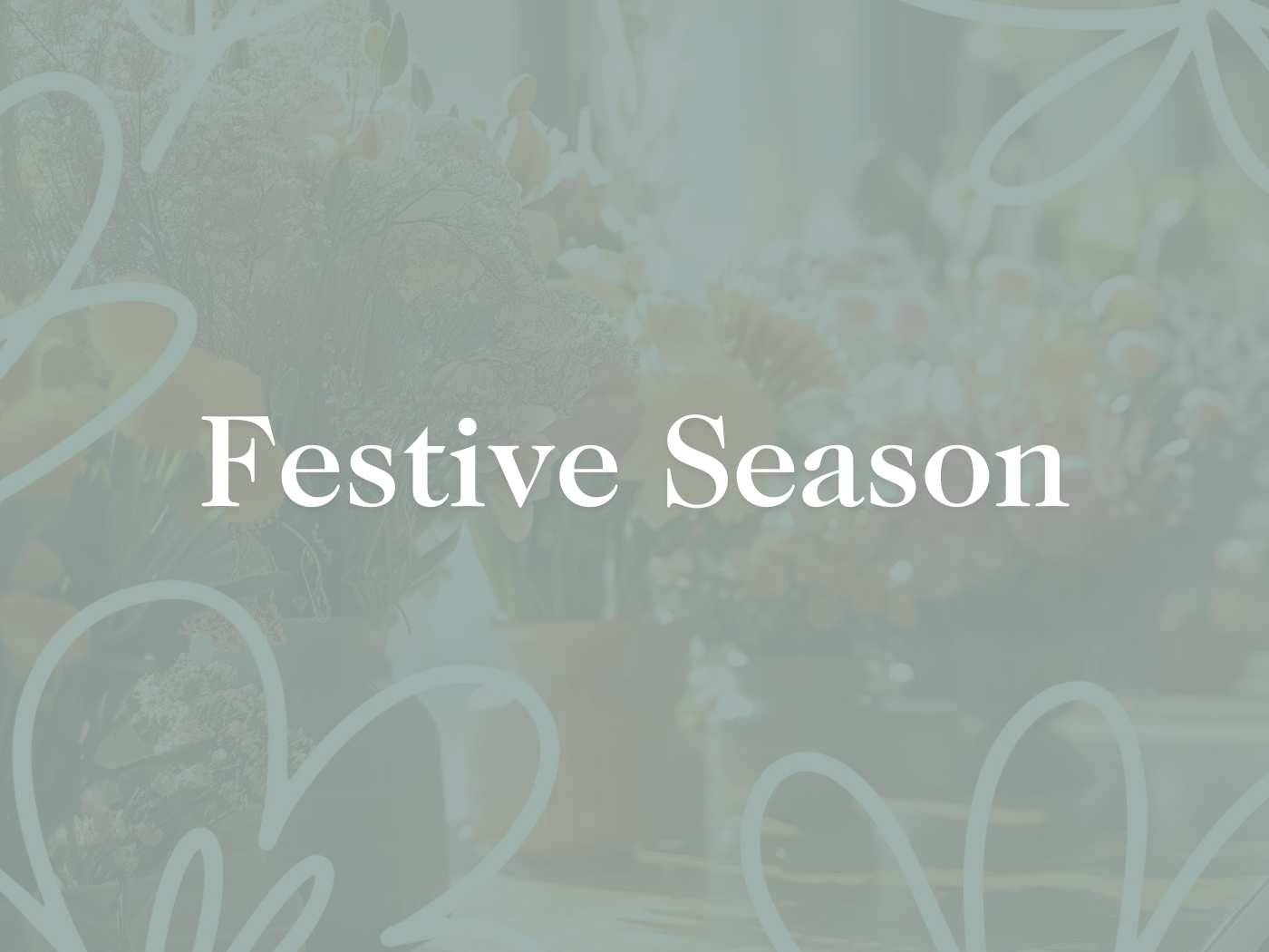 Text overlay 'Festive Season' on a muted background of festive gifts and flowers, part of the Festive Season Collection, delivered with heart by Fabulous Flowers and Gifts.