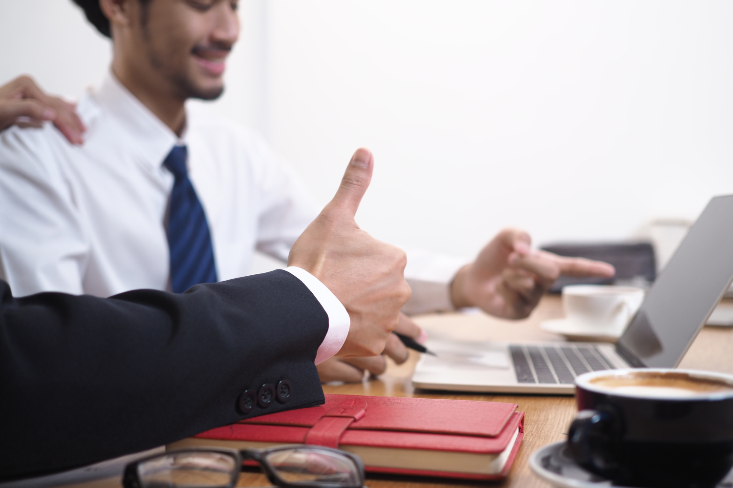 Manager praising employee.