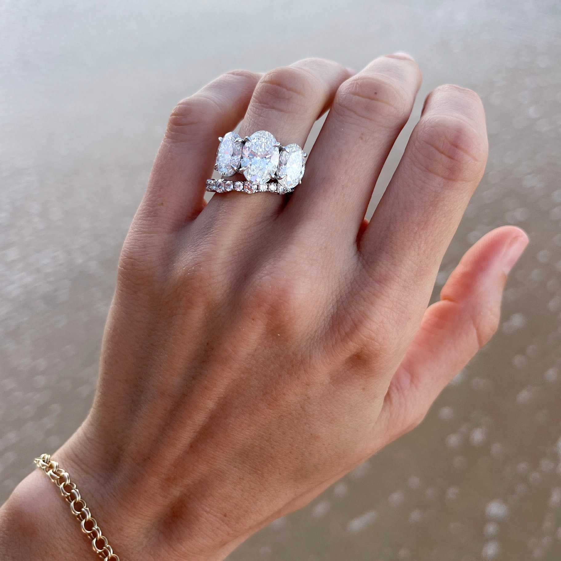 Triad Engagement Ring With Oval Cut Diamonds