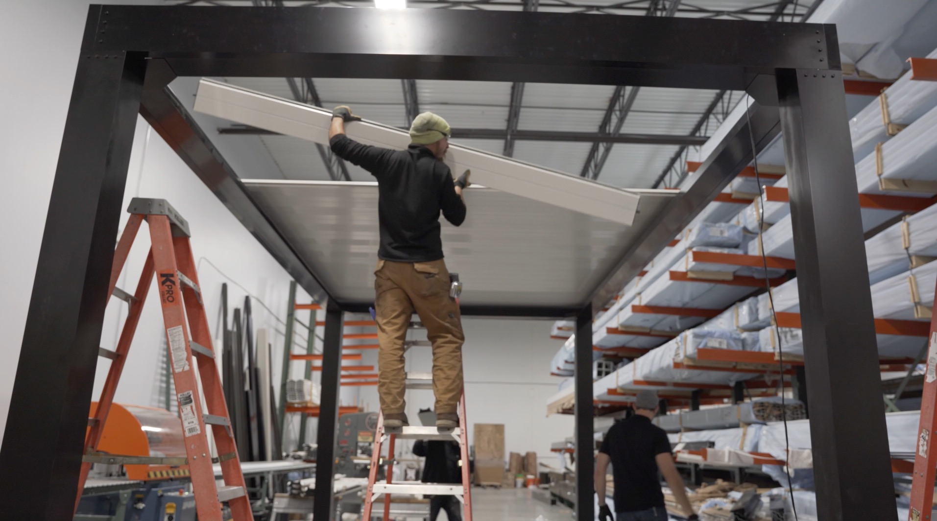 Assembling A DIY Aluminum Pergola In Manufacturing Facility