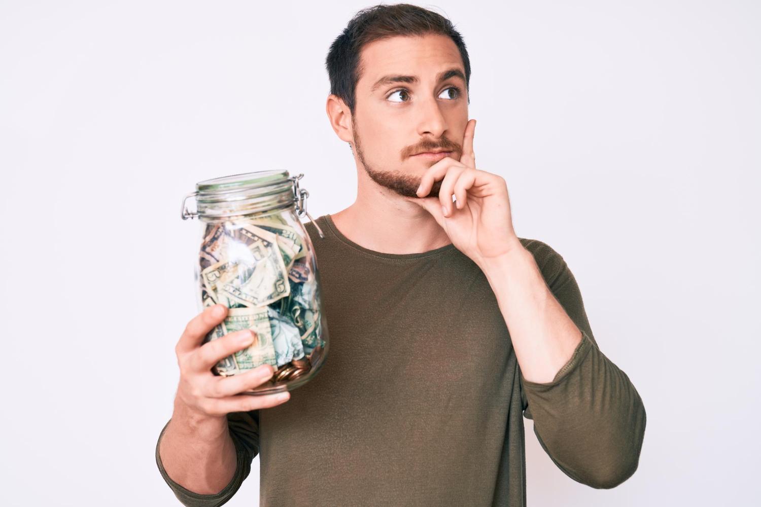 man calculating the initial costs of dropshipping