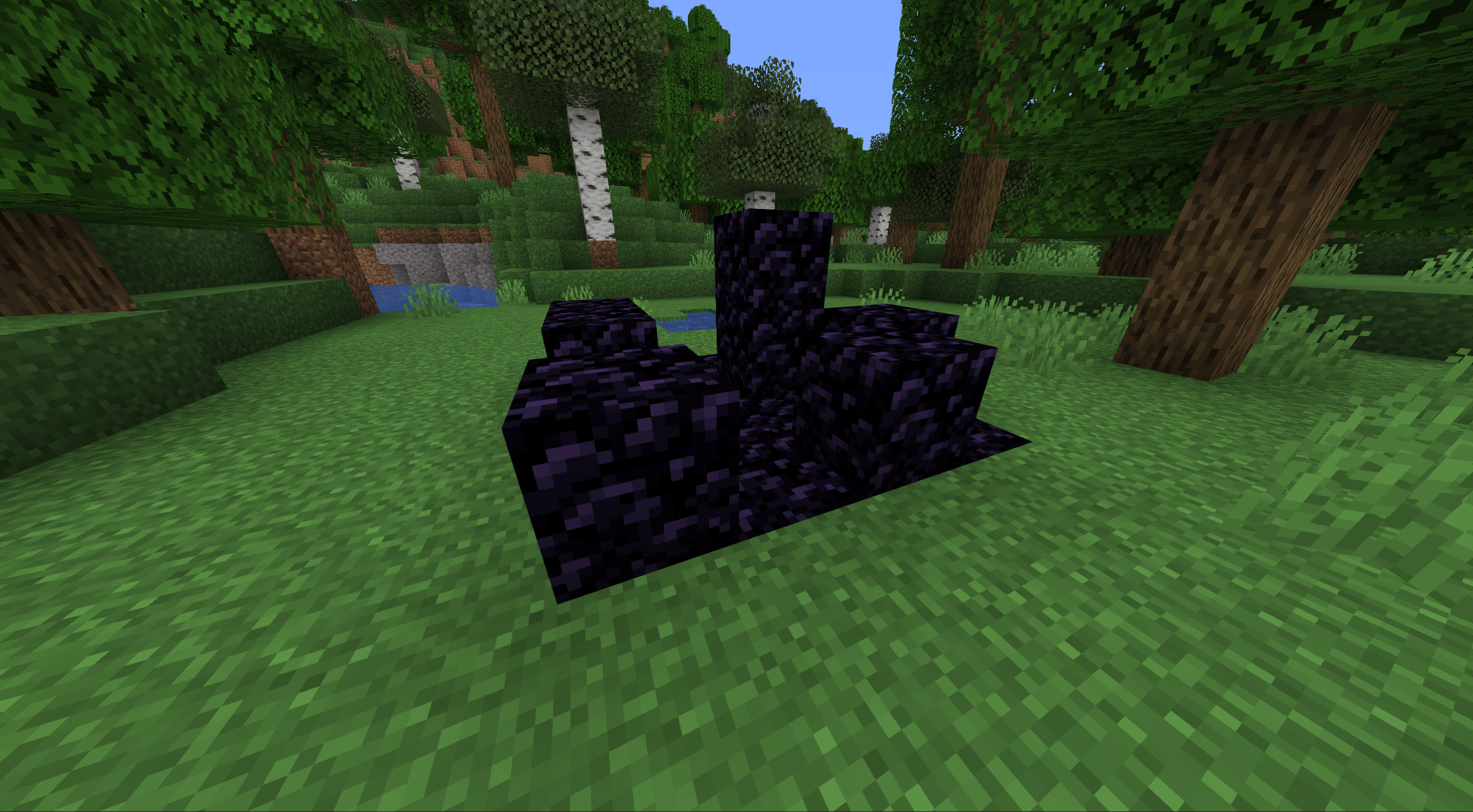 The Obsidian Block is quite distinct, standing out from the typical dirt blocks.
