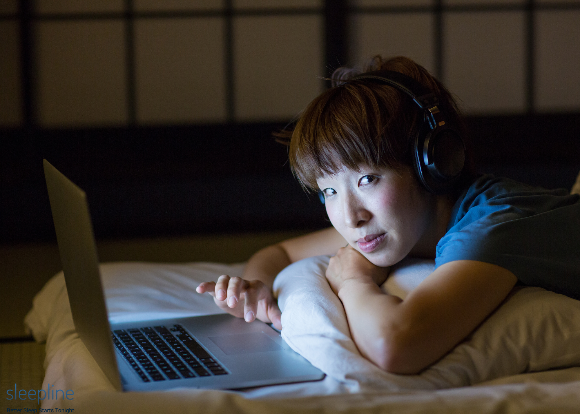 Person laying down on a comfortable Japanese futon