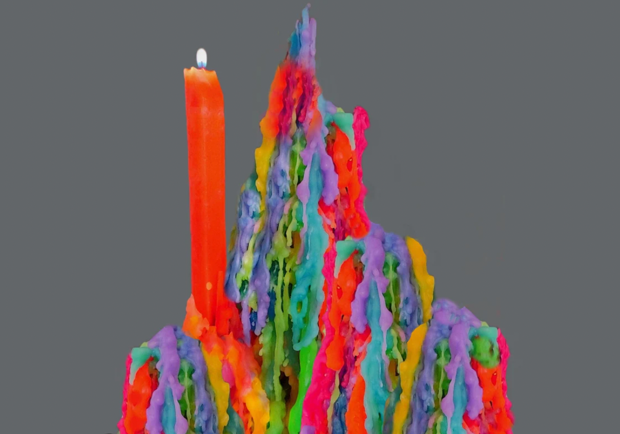 Colorful drip candles make a piece of art.