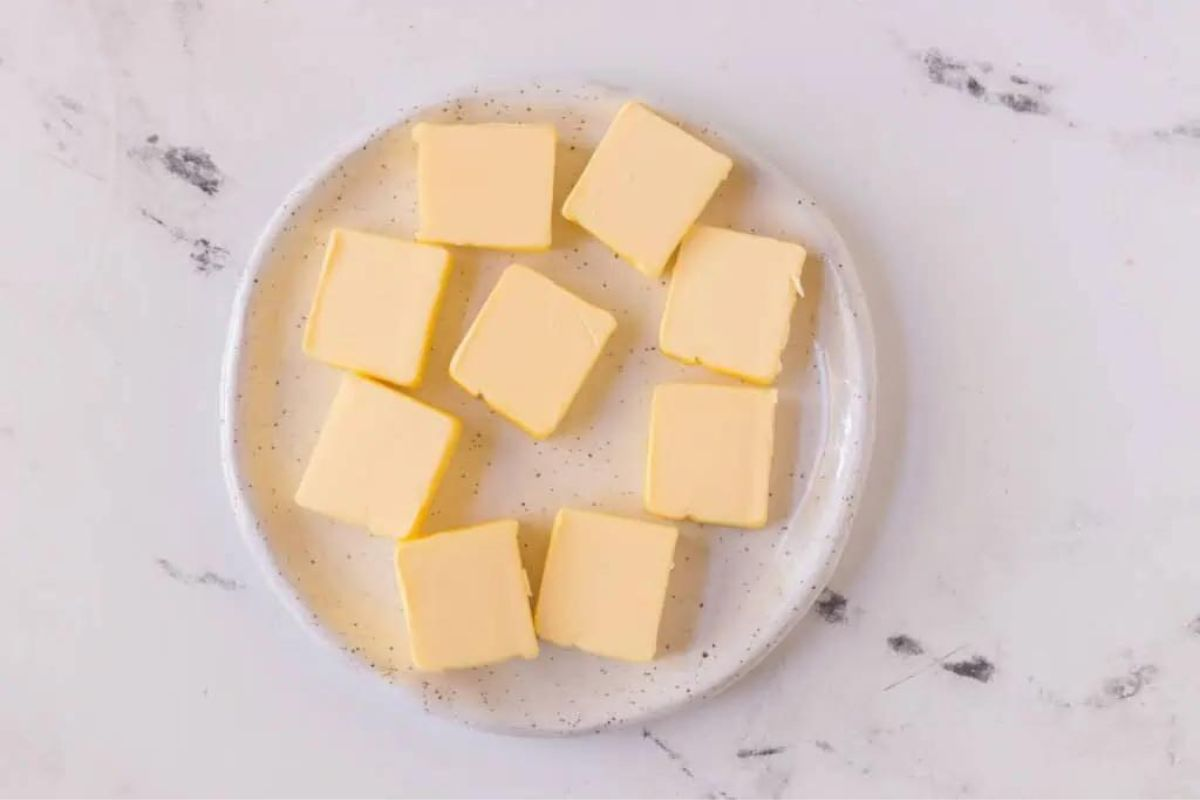 Cut butter into small pieces for easier blending.