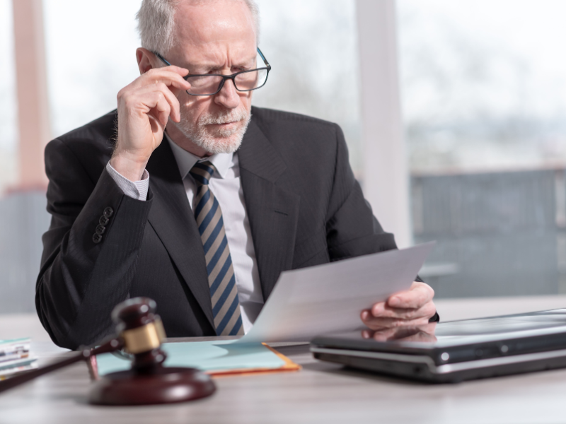 Image showing a lawyer with documents and showing the OCGA § 40-6-270.
