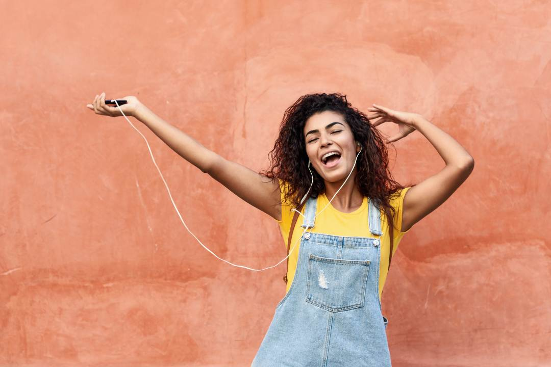 woman listening to music and singing about oral nac, amino acid cysteine, further reasearch and oral administration - The Good Stuff