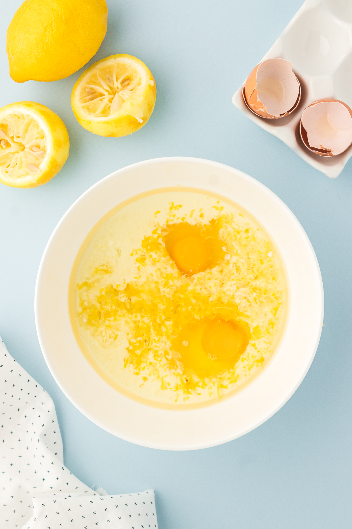 lemon blueberry quick bread wet ingredients in bowl 