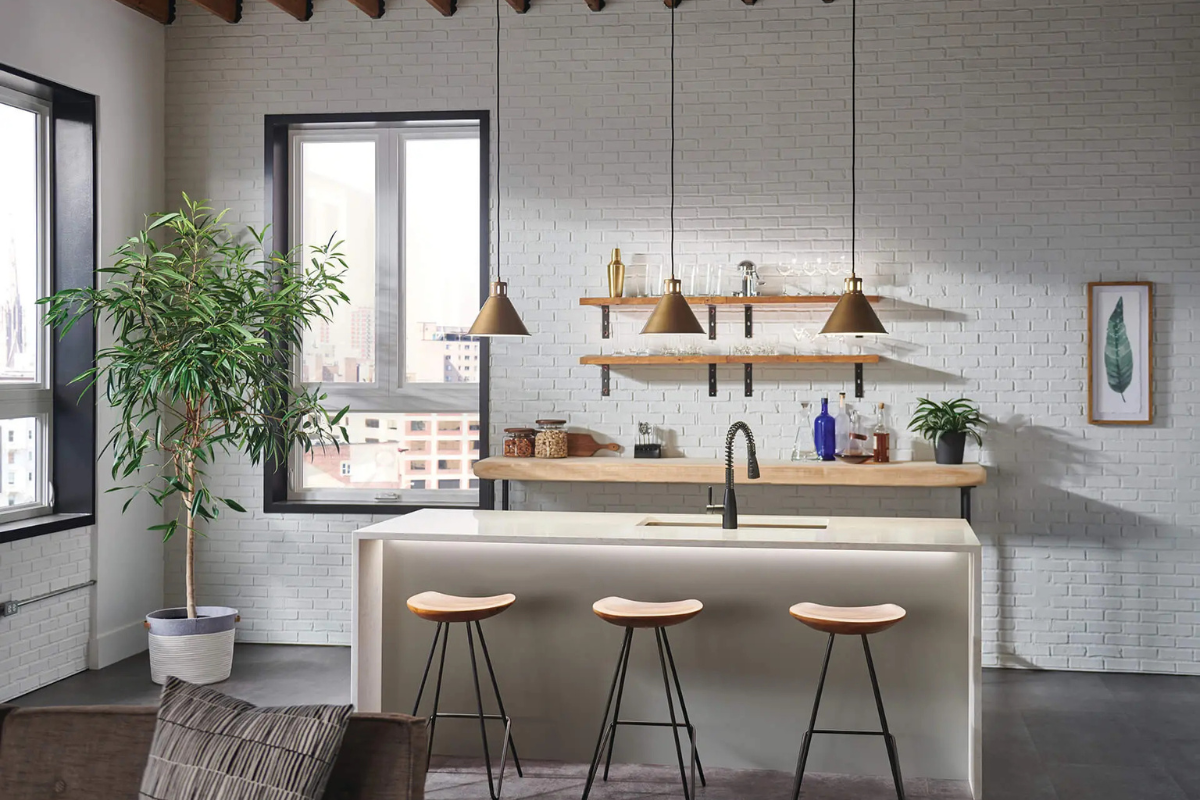 Pendant light fixtures over a kitchen island show the result of a modern industrial look, with access to a variety of more options in finishes and inches.