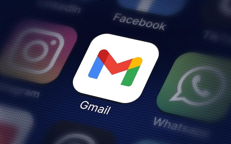A phone screen with the Gmail icon lit up.