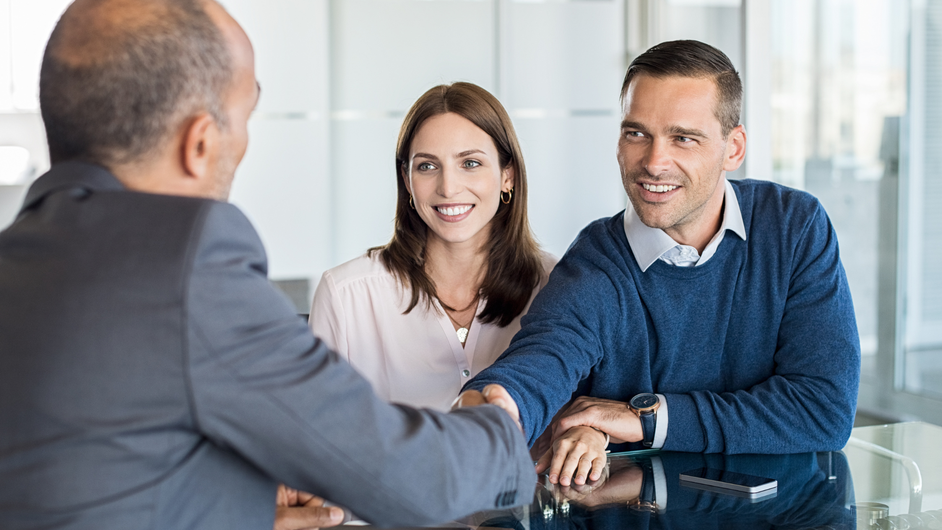 happy couple investing in a house and land package