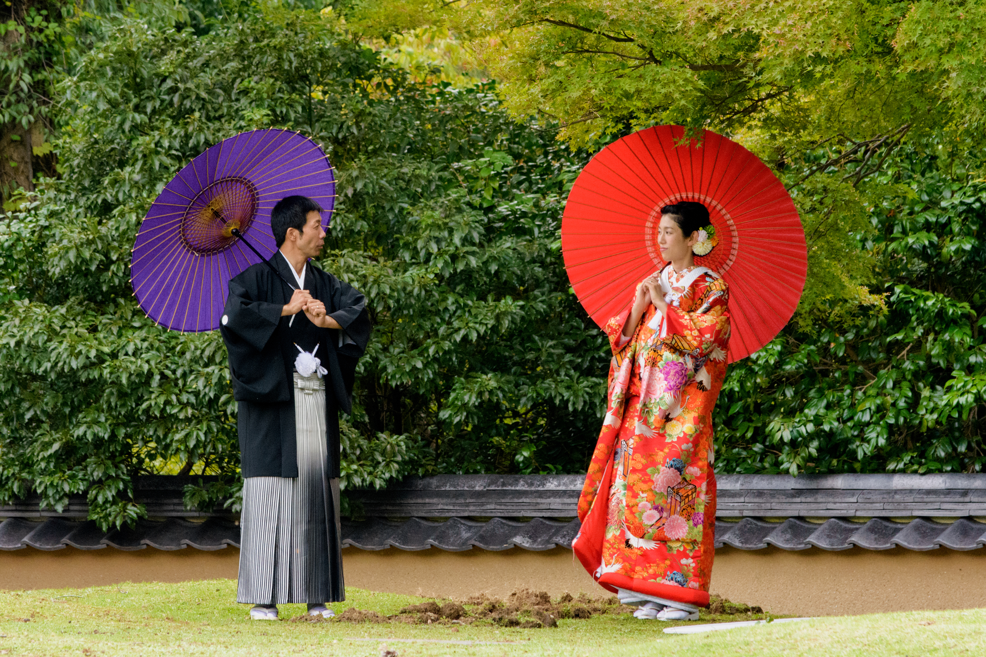 Japanese men and women wearing kimono