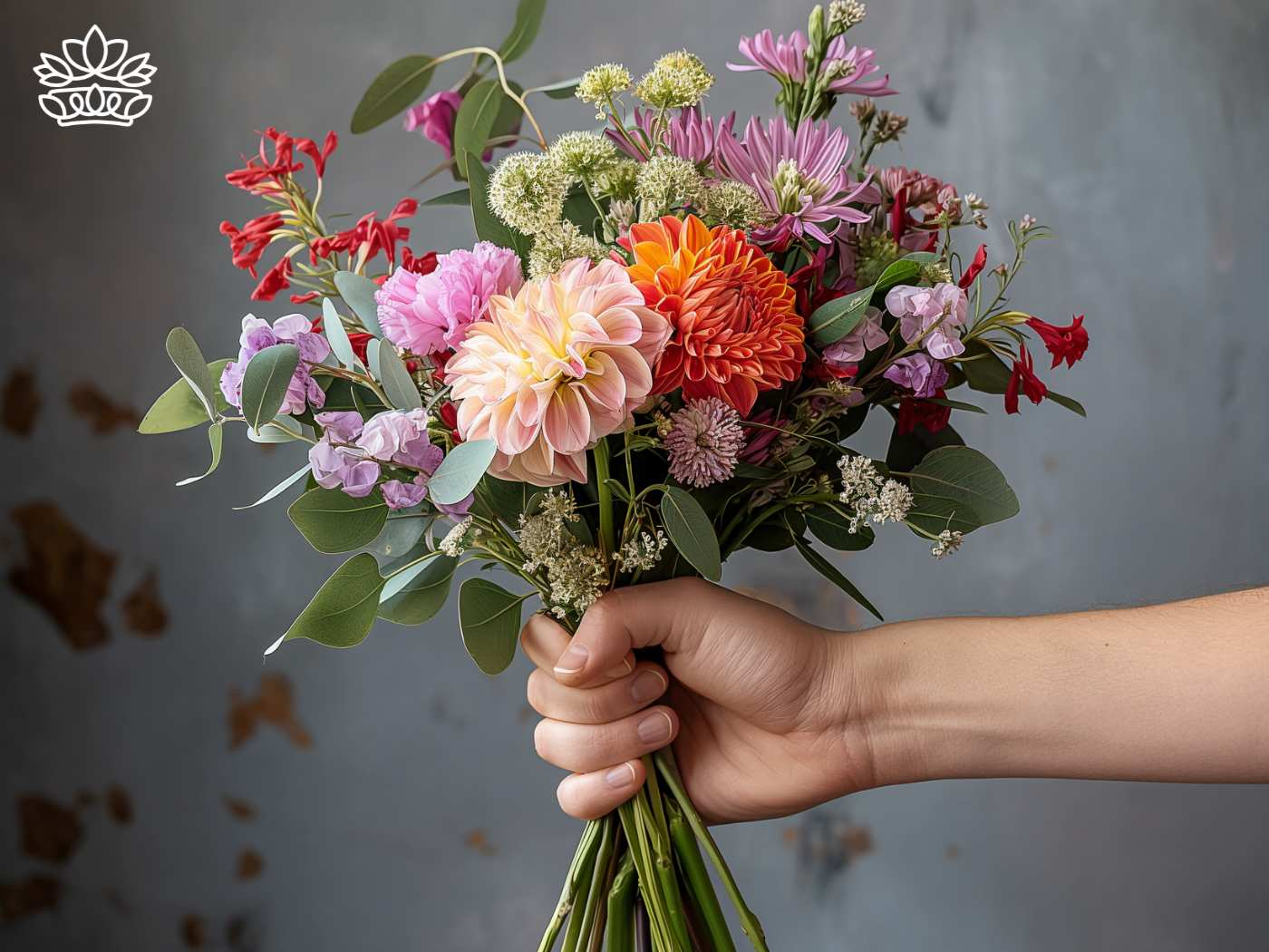 Lush and vibrant hand-tied bouquet featuring a variety of fresh flowers, perfect for any occasion, curated by Fabulous Flowers and Gifts.