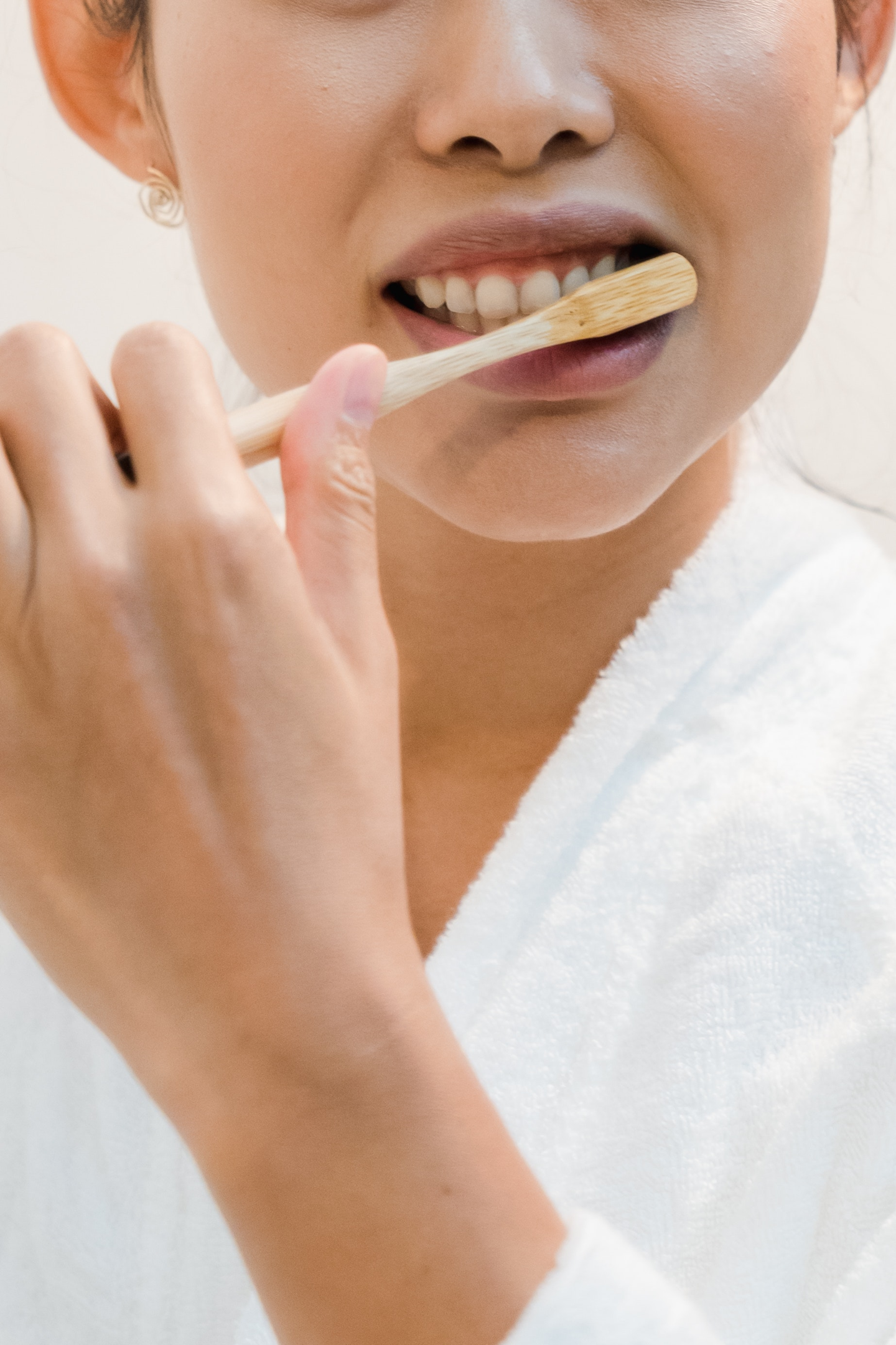 Women Bbrushing Her Teeth
