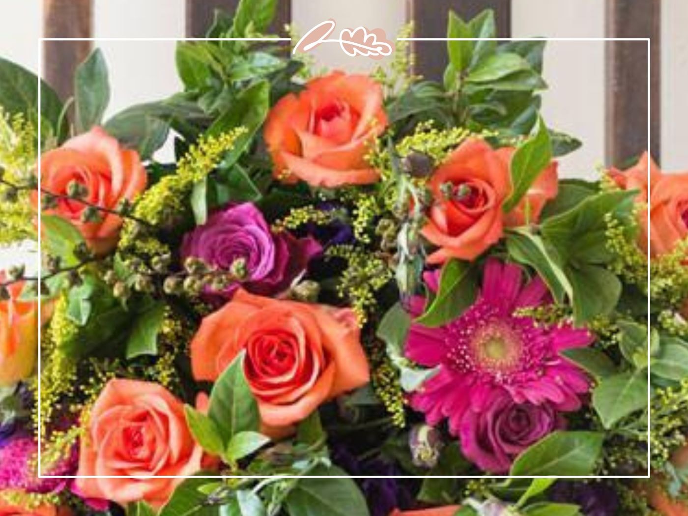Bright orange and purple bouquet with lush greenery – Where Can I Get Flowers? blog by Fabulous Flowers and Gifts.