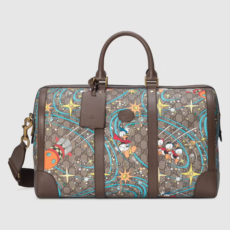 Gucci Disney x Donald Duck Large Suitcase | Designer Luggage Worth Investing In